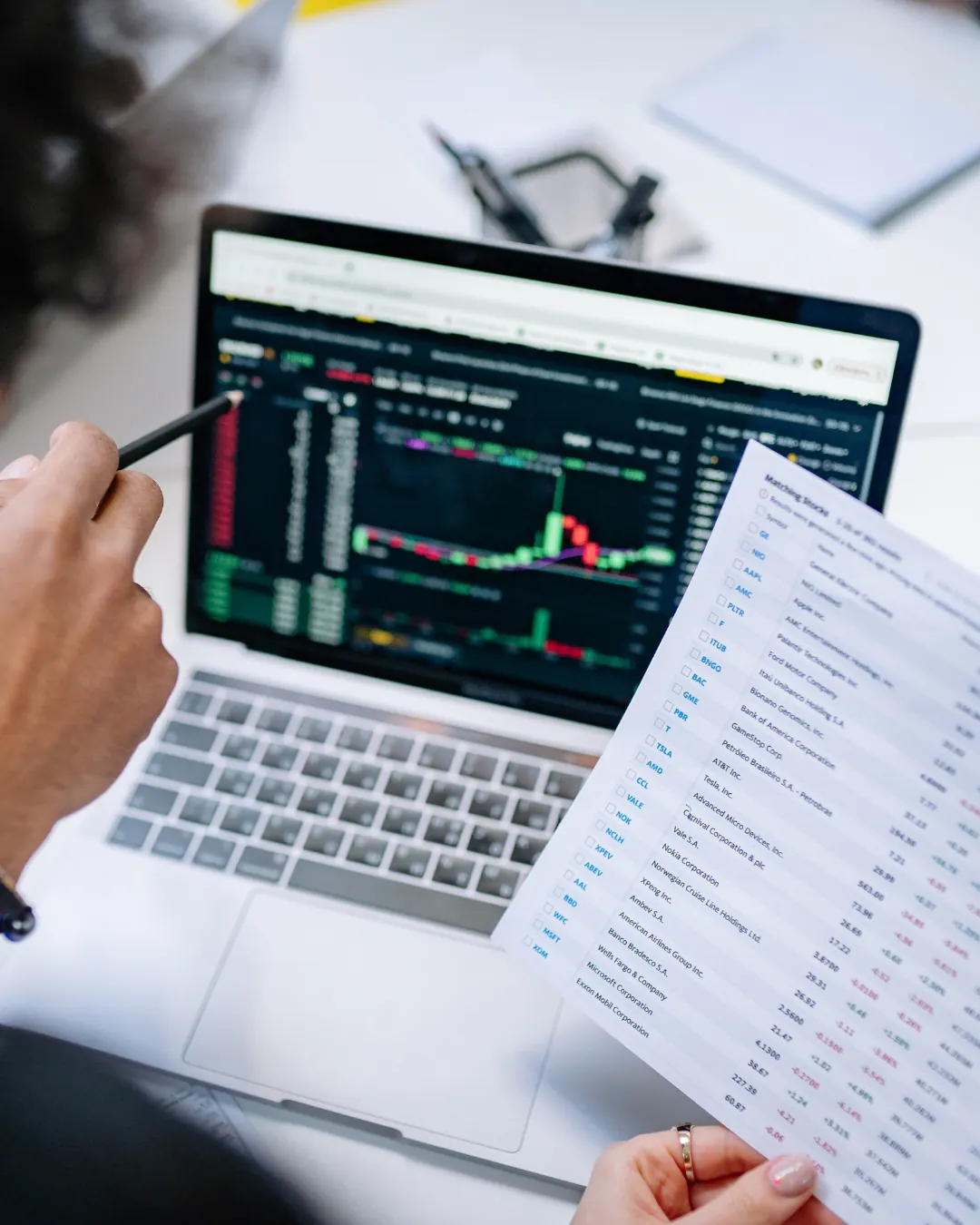 Reviewing account statements on a laptop